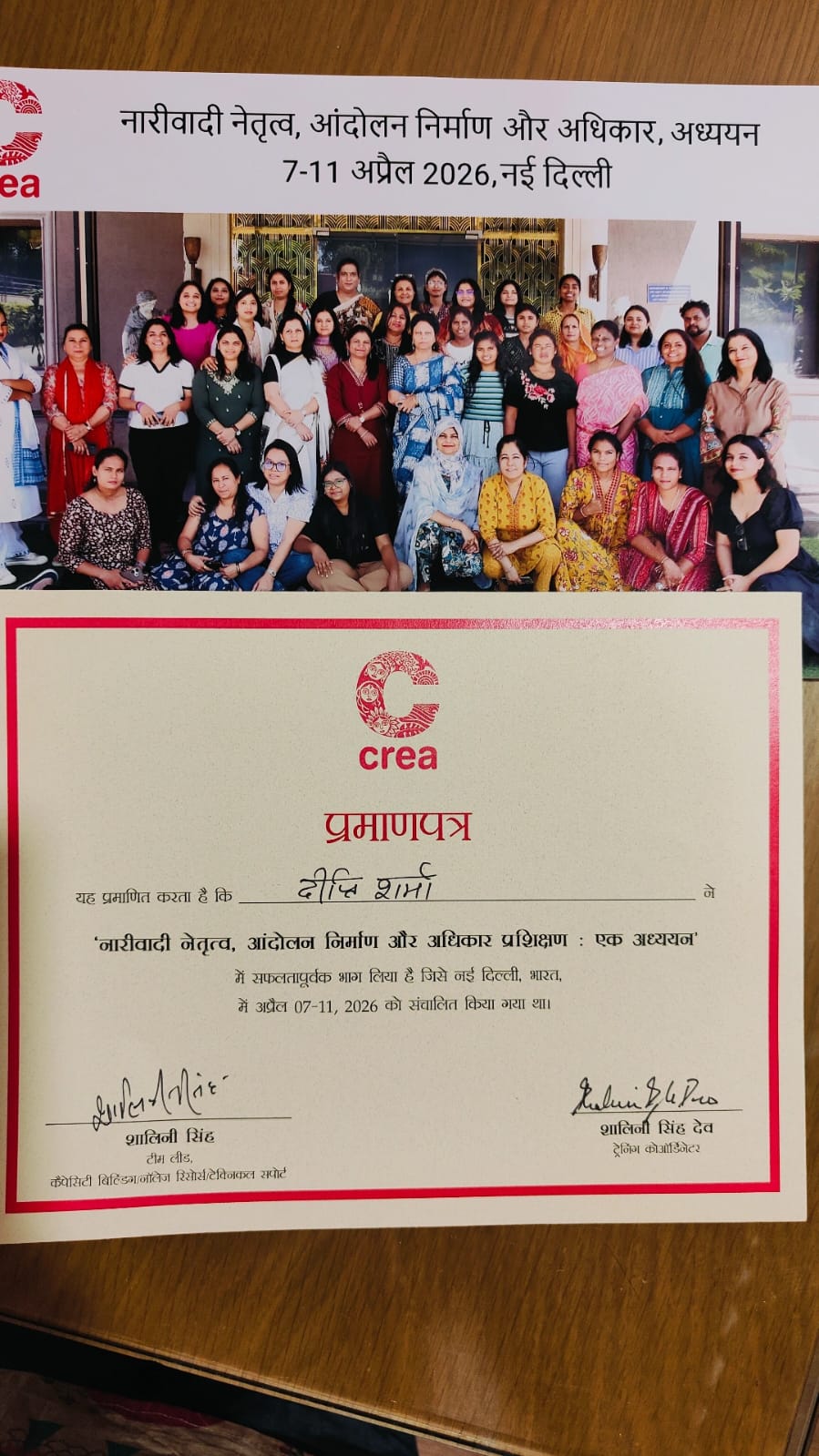 CREA training certificate with group photograph